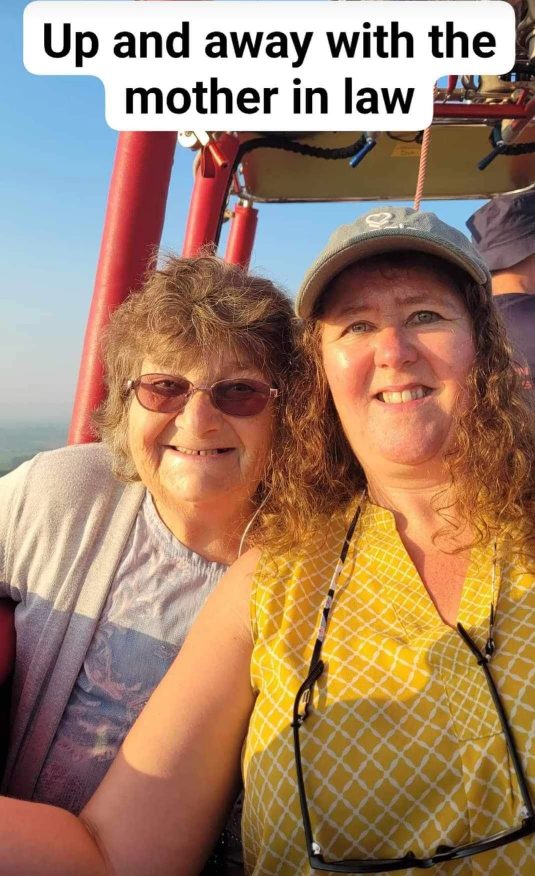 Mother and daughter enjoying a hot air balloon ride